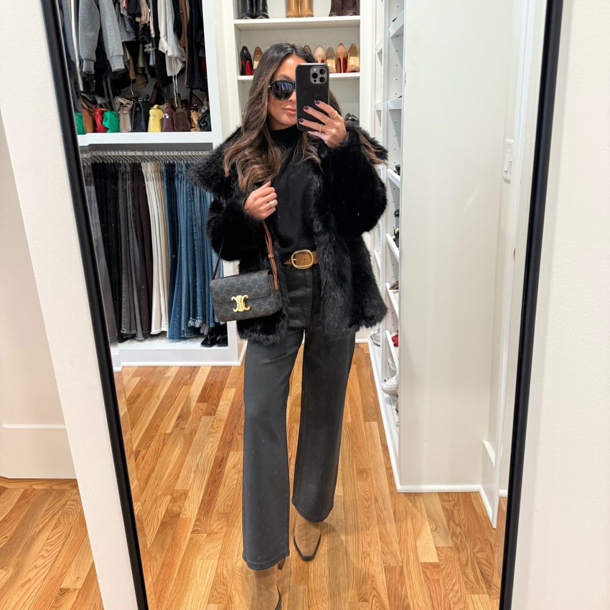 A Black Faux-Fur Jacket with Wide-Leg Jeans for Polished Winter Style