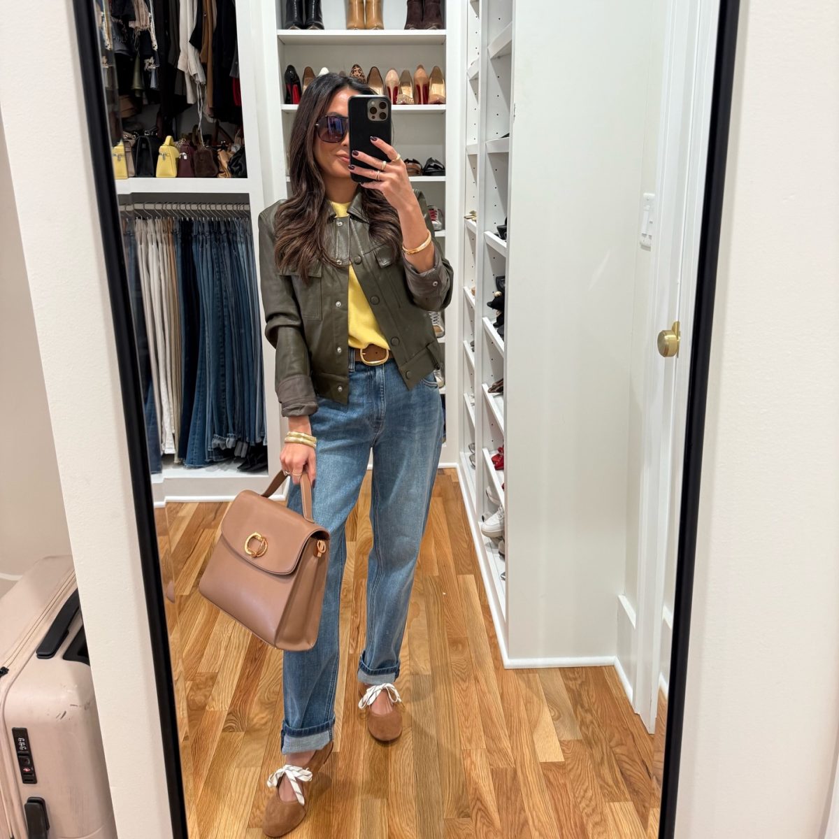 An Olive Leather Jacket with a Yellow Sweater for Transitional Days