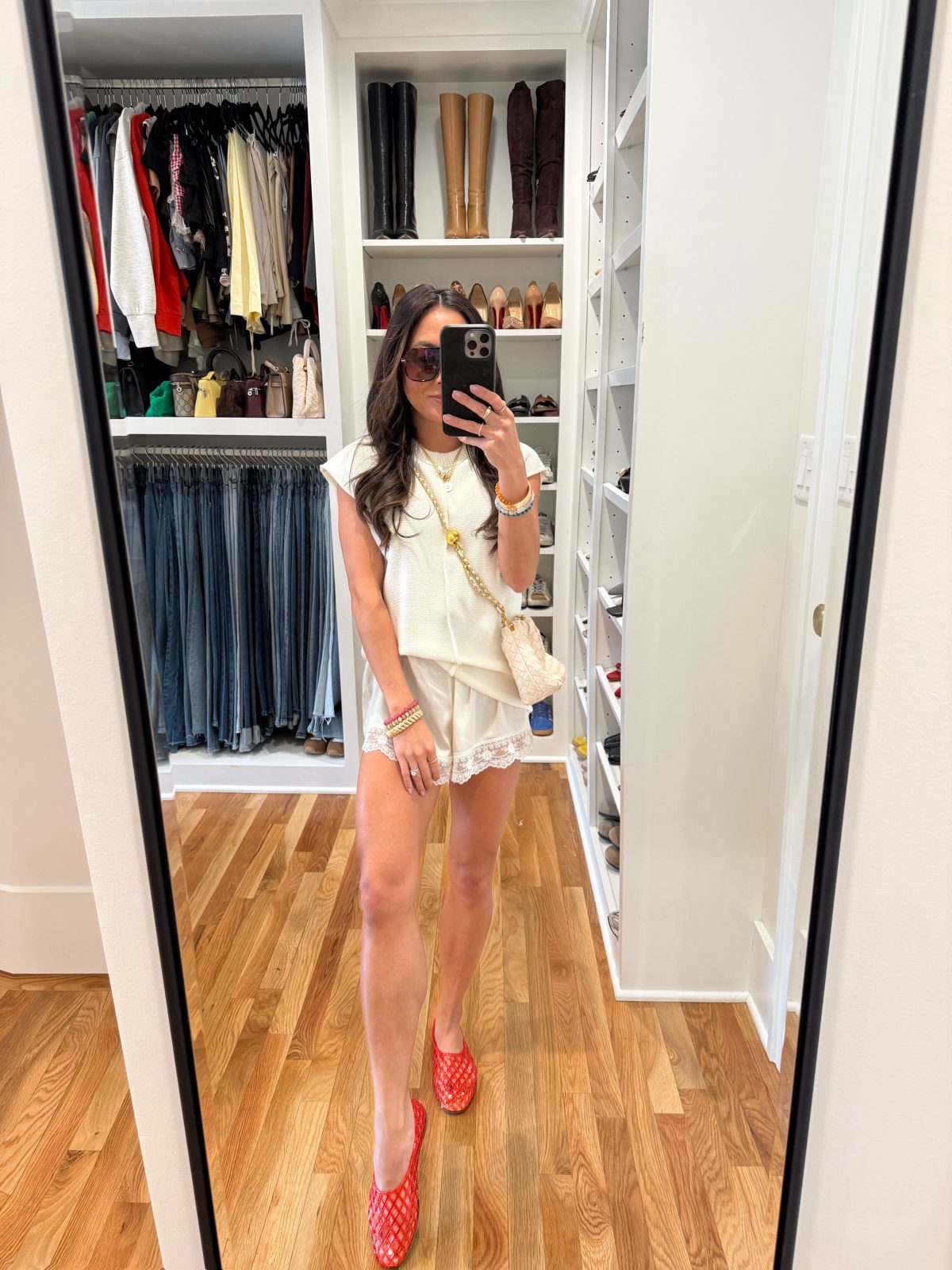 A Cream Knit Top with Lace-Trim Shorts and Bright Red Flats