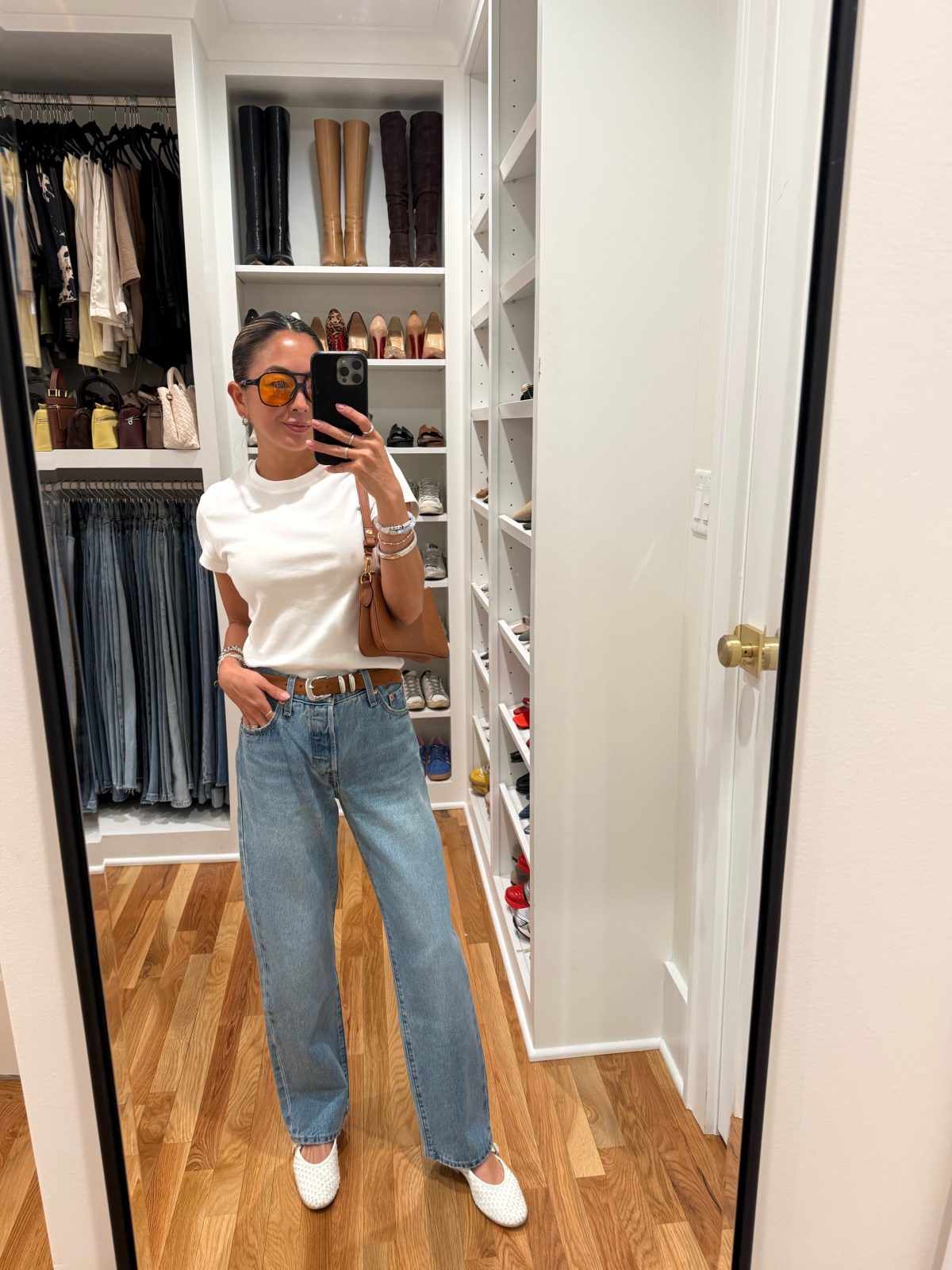 A White Tee with Wide-Leg Jeans and Woven Flats for Everyday Ease